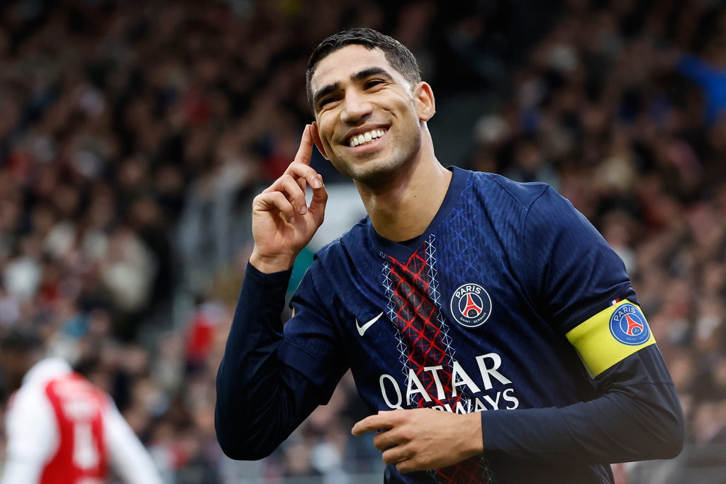 PSG's Achraf Hakimi celebrates after scoring his side's second goal during the French League One soccer match between Brest and Paris Saint Germain in Brest, France, Saturday, Oct. 25, 2025. (AP Photo/Jeremias Gonzalez)