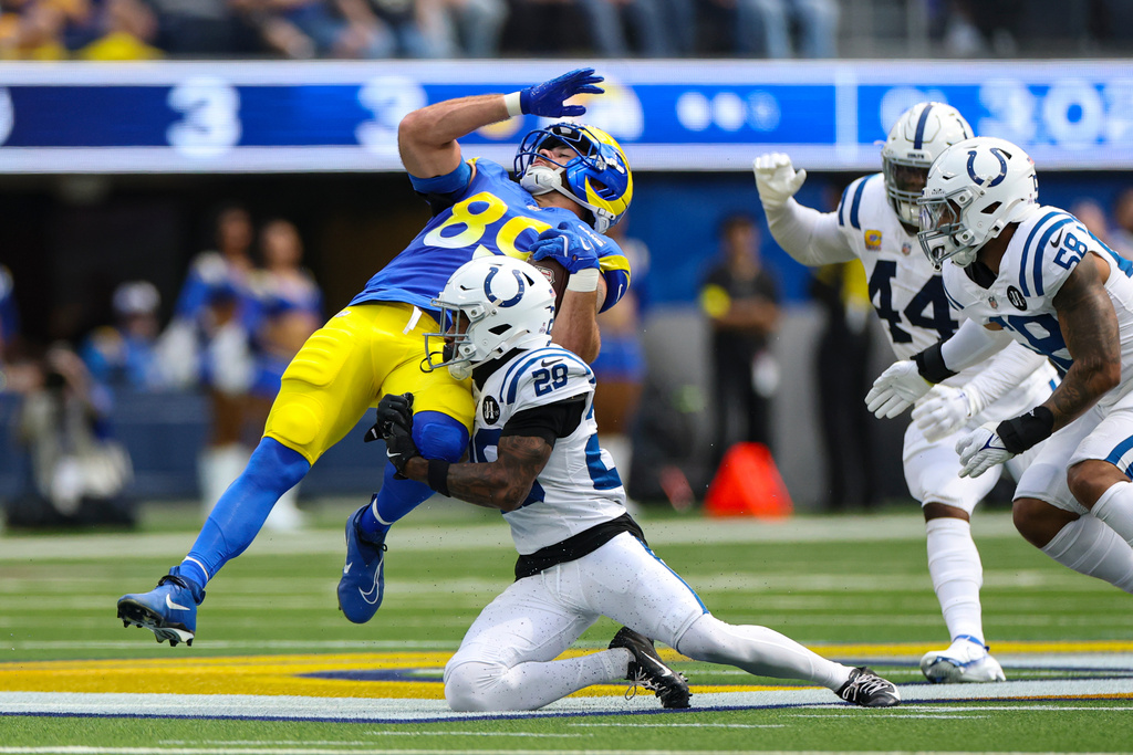 Los Angeles Rams tight end Tyler Higbee (89) is tackled by Indianapolis Colts cornerback Mekhi Blackmon (29) during the first hall of an NFL football game Sunday, Sept. 28, 2025, in Inglewood, Calif. (AP Photo/Eric Thayer)