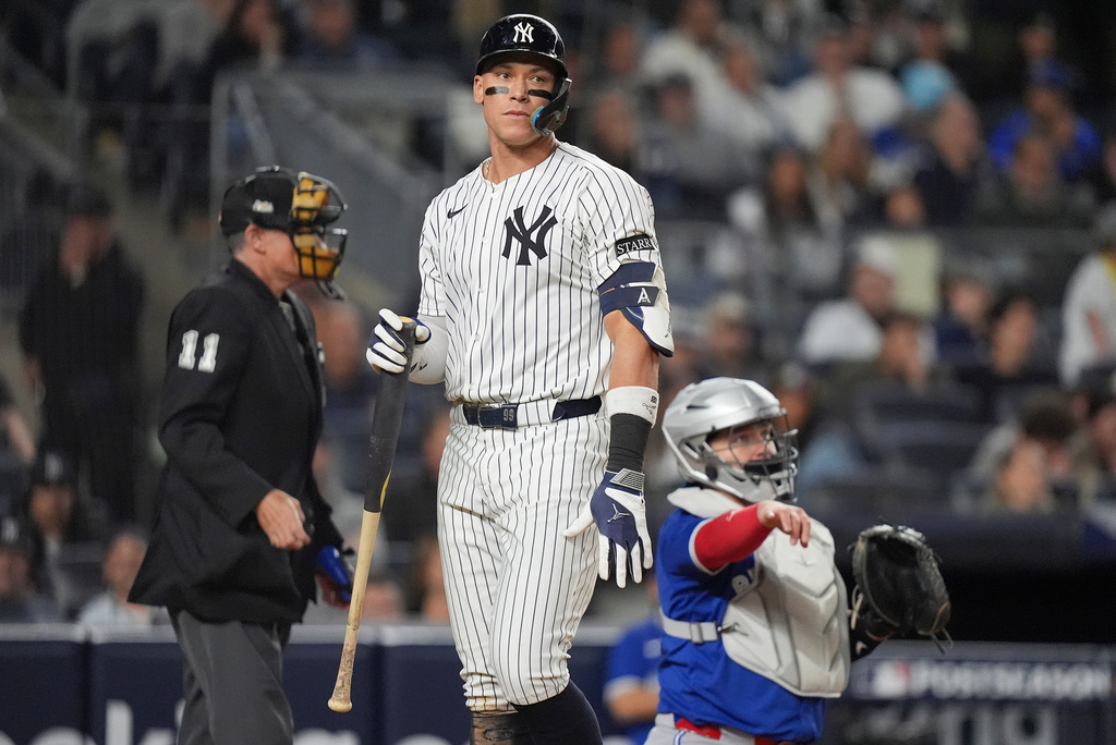 New York Yankees' Aaron Judge reacts after striking out against the Toronto Blue Jays during the eighth inning of Game 4 of baseball's American League Division Series, Wednesday, Oct. 8, 2025, in New York. (AP Photo/Frank Franklin II)