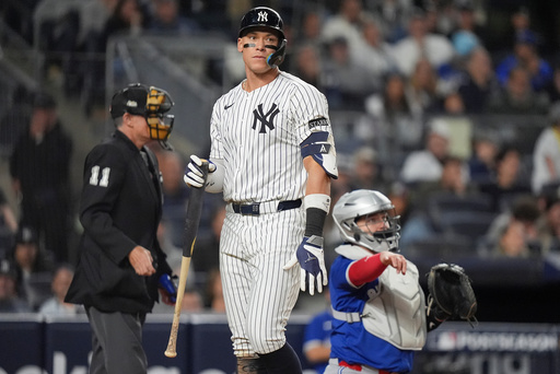New York Yankees' Aaron Judge reacts after striking out against the Toronto Blue Jays during the eighth inning of Game 4 of baseball's American League Division Series, Wednesday, Oct. 8, 2025, in New York. (AP Photo/Frank Franklin II) New York Yankees' Aaron Judge reacts after striking out against the Toronto Blue Jays during the eighth inning of Game 4 of baseball's American League Division Series, Wednesday, Oct. 8, 2025, in New York. (AP Photo/Frank Franklin II)
