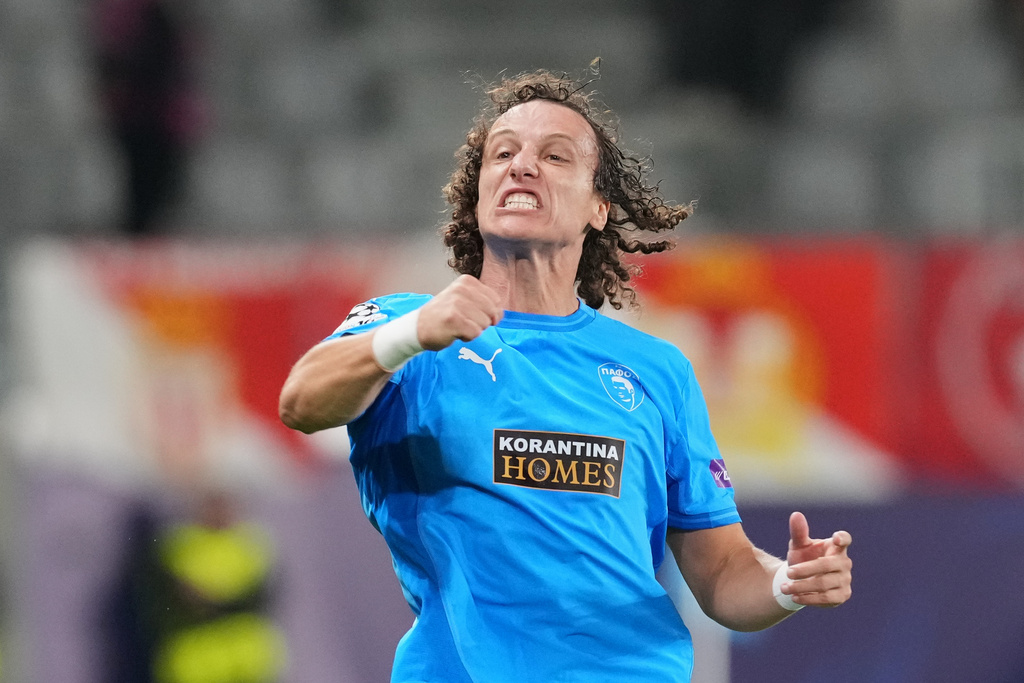 Pafos' David Luiz celebrates after scoring his side's opening goal during the Champions League opening phase soccer match between Pafos FC and AS Monaco in Limassol, Cyprus, Wednesday, Nov. 26, 2025. (AP Photo/Petros Karadjias)