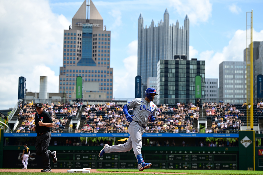 Chicago Cubs' Michael Busch runs the bases after hitting a solo home run off Pittsburgh Pirates starting pitcher Carmen Mlodzinski during the fifth inning of a baseball game, Monday, May 25, 2026, in Pittsburgh. (AP Photo/David Dermer)