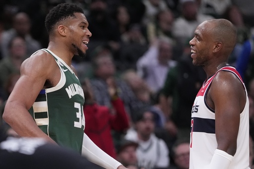Milwaukee Bucks' Giannis Antetokounmpo and Washington Wizards' Khris Middleton share a laugh during the second half of an NBA basketball game Wednesday, Oct. 22, 2025, in Milwaukee. (AP Photo/Morry Gash) Milwaukee Bucks' Giannis Antetokounmpo and Washington Wizards' Khris Middleton share a laugh during the second half of an NBA basketball game Wednesday, Oct. 22, 2025, in Milwaukee. (AP Photo/Morry Gash)