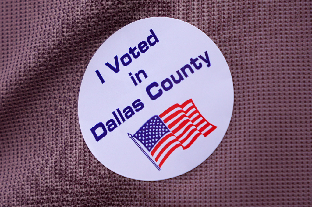 FILE - A primary voter wears a sticker after casting a ballot at a voting center in Dallas, Tuesday, March 3, 2026. (AP Photo/LM Otero, File)