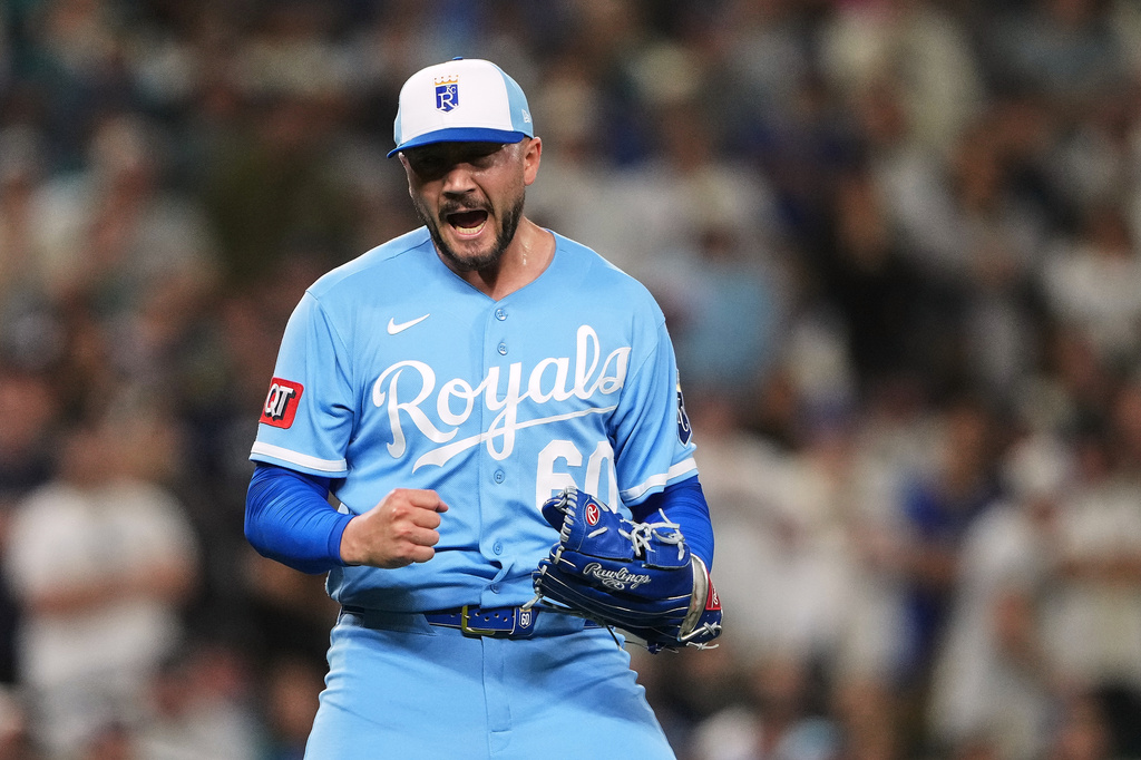 Kansas City Royals relief pitcher Lucas Erceg reacts to earning the save in a win in 10 innings over the Seattle Mariners in a baseball game, Saturday, May 2, 2026, in Seattle. (AP Photo/Lindsey Wasson)