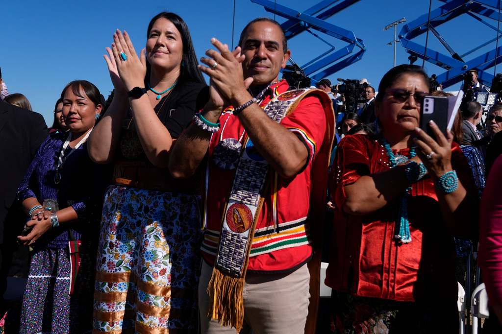 FILE - Attendees clap at an event with President Joe Biden at the Gila Crossing Community School in the Gila River Indian Community reservation in Laveen, Ariz., Friday, Oct. 25, 2024. (AP Photo/Manuel Balce Ceneta,File)