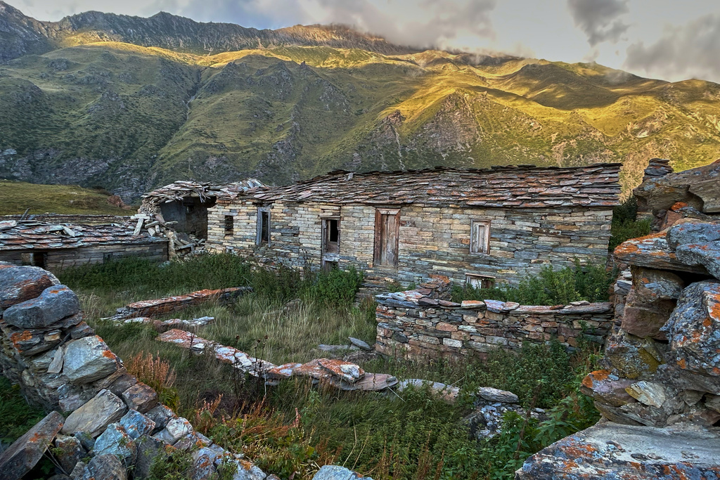Lichen grows on walls of abandoned stone houses in Martoli village, in the northern Indian Himalayan state of Uttarakhand, Oct. 4, 2025. (AP Photo/Satish Sharma)