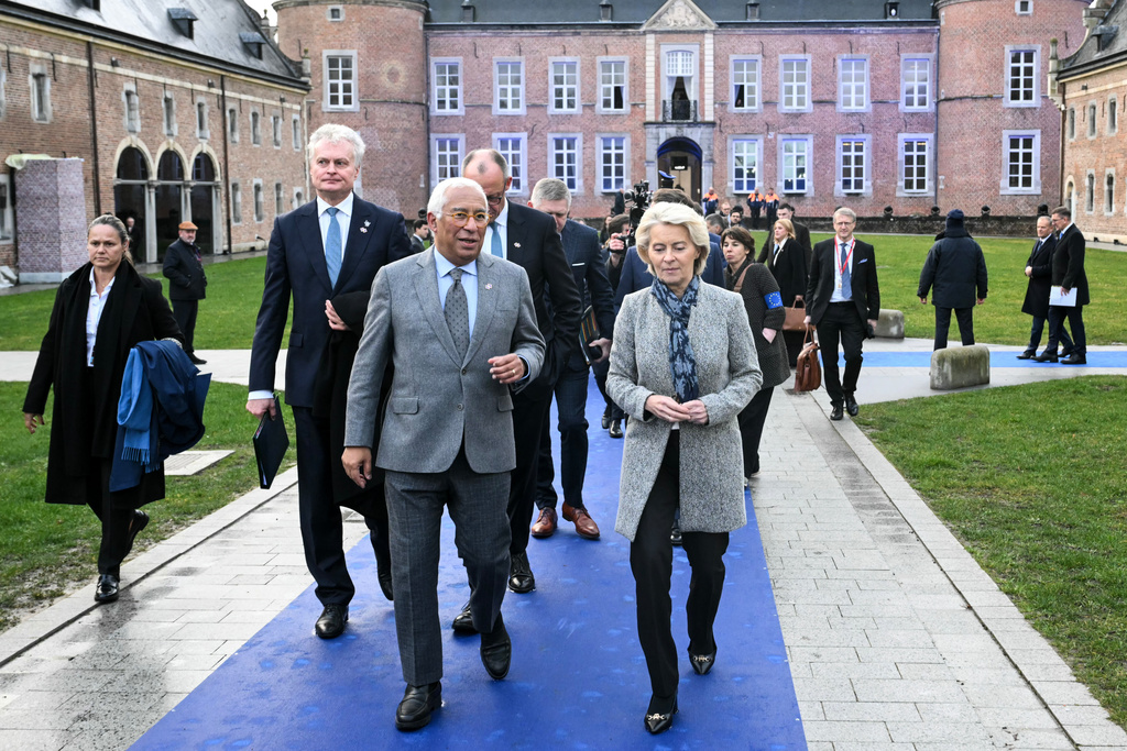 European Council President Antonio Costa, center, speaks with European Commission President Ursula von der Leyen, center right, during the EU summit at Alden Biesen Castle in Bilzen-Hoeselt, Belgium, Thursday, Feb. 12, 2026. (Nicolas Tucat, Pool Photo via AP)