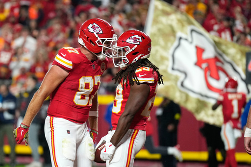 Kansas City Chiefs running back Kareem Hunt, right, is congratulated by teammate Travis Kelce (87) after catching a touchdown pass during the second half of an NFL football game against the Washington Commanders Monday, Oct. 27, 2025, in Kansas City, Mo. (AP Photo/Charlie Riedel) Kansas City Chiefs running back Kareem Hunt, right, is congratulated by teammate Travis Kelce (87) after catching a touchdown pass during the second half of an NFL football game against the Washington Commanders Monday, Oct. 27, 2025, in Kansas City, Mo. (AP Photo/Charlie Riedel)