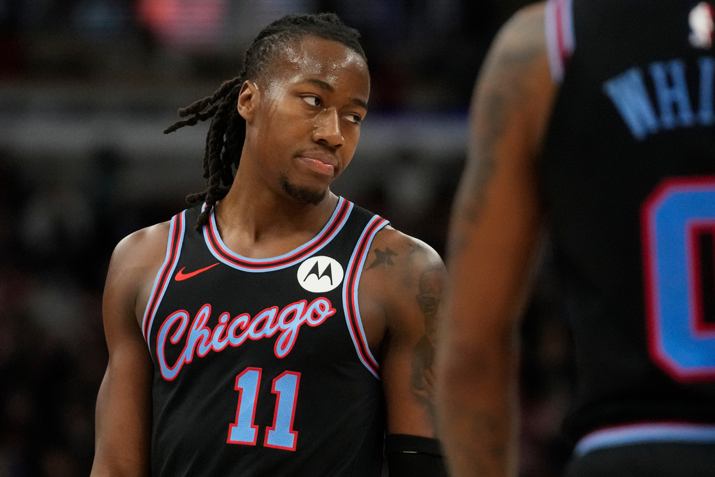 Chicago Bulls guard Ayo Dosunmu (11) reacts after a foul is called on him during the first half of an NBA basketball game against the Miami Heat, Thursday, Jan. 29, 2026, in Chicago. (AP Photo/Erin Hooley)
