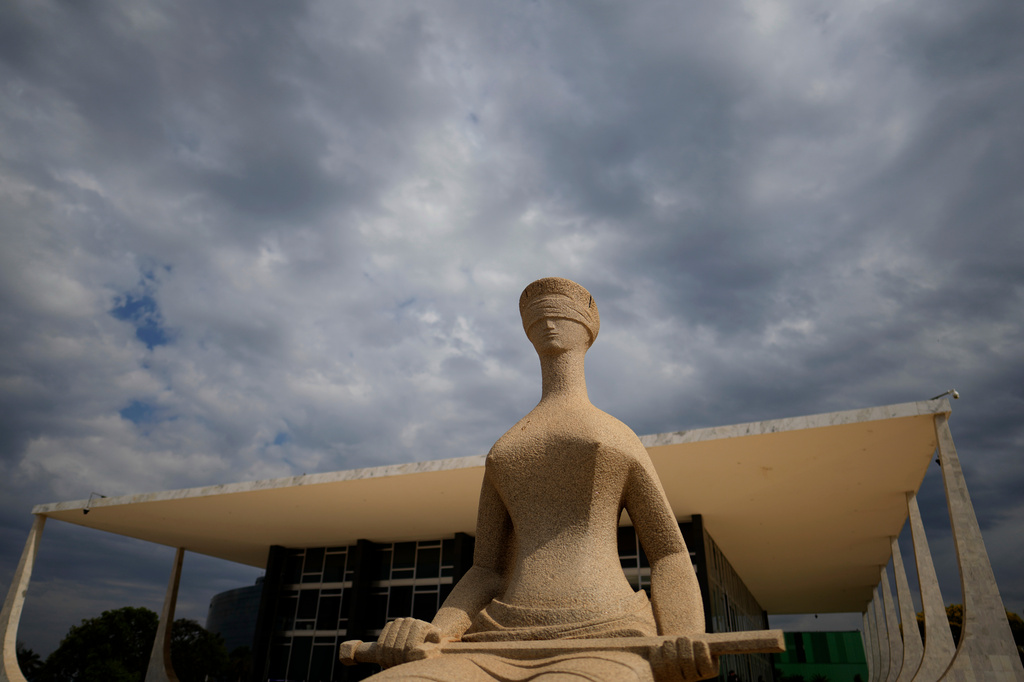 The Statue of Justice stands outside the Supreme Court building ahead of a plenary session in Brasilia, Brazil, Wednesday, Sept. 2, 2026. (AP Photo/Eraldo Peres)
