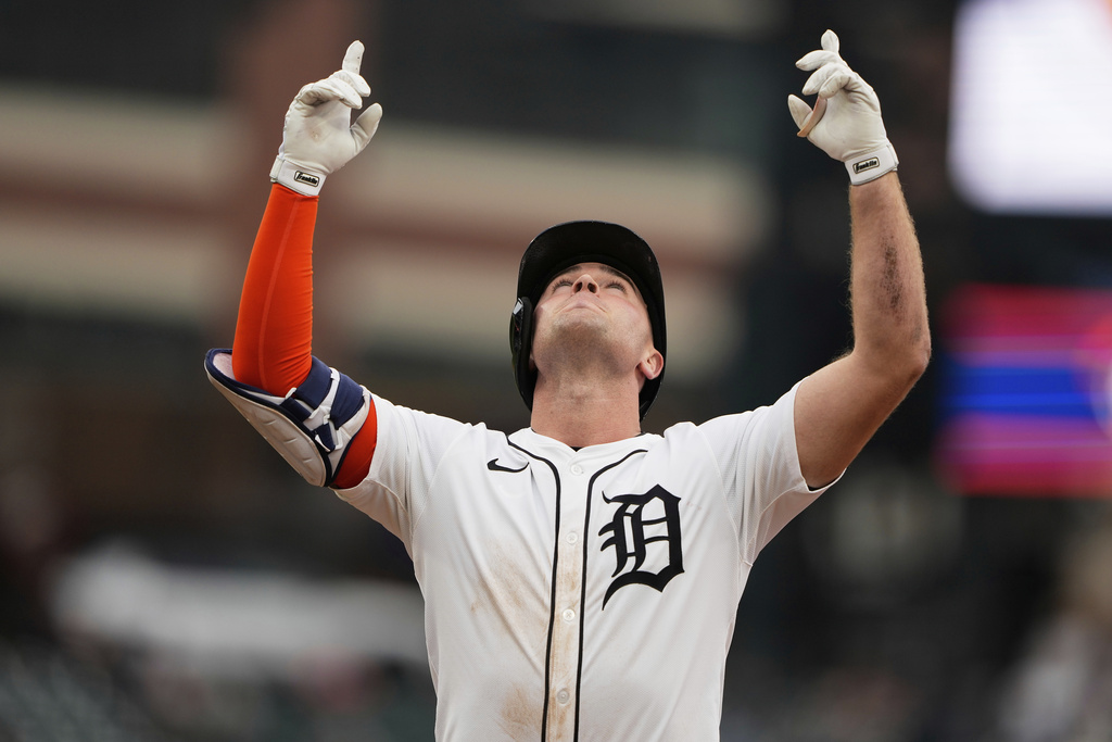 Detroit Tigers designated hitter Kerry Carpenter celebrates after hitting a single during the ninth inning of a baseball game against the Atlanta Braves, Sunday, Sept. 21, 2025, in Detroit. (AP Photo/Ryan Sun)