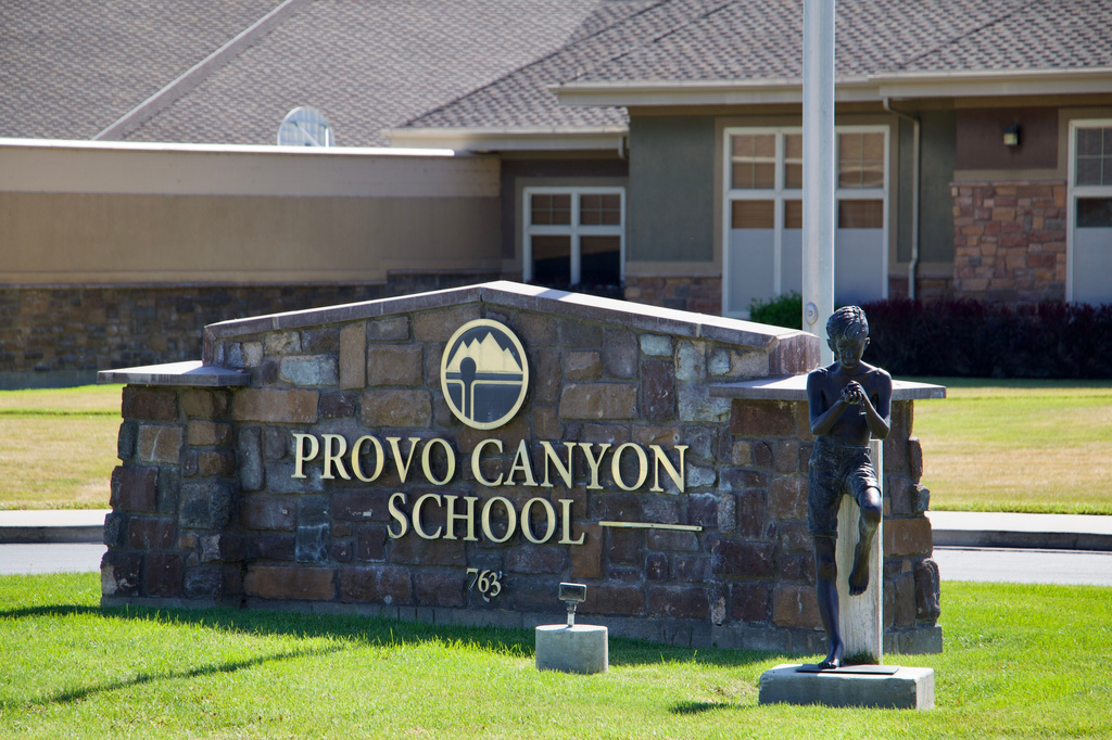 Signage for the Provo Canyon School in Springville, Utah, is pictured Monday, June 15, 2026. (AP Photo/Hannah Schoenbaum)