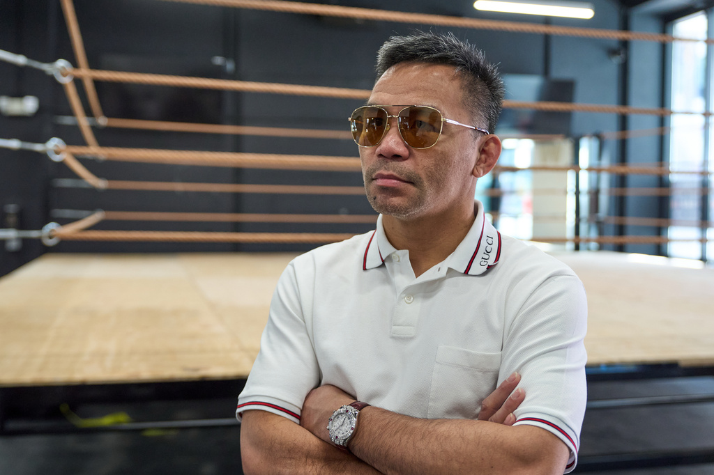 Boxer Manny Pacquiao pauses for a picture while touring the "Pacquiao Prime Boxing," his newly acquired gym in Hollywood, on Monday, April 6, 2026. The facility was formerly owned by rival Floyd Mayweather Jr. (AP Photo/Damian Dovarganes)