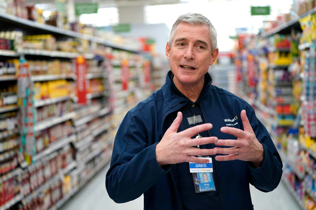 FILE - In this Nov. 9, 2018, file photo, Walmart U.S. President and CEO Greg Foran speaks during an interview at a Walmart Supercenter in Houston. (AP Photo/David J. Phillip, File)