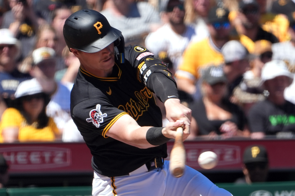 Pittsburgh Pirates' Henry Davis singles off of Minnesota Twins pitcher Mike Paredes driving in two runs in the fifth inning of a baseball game in Pittsburgh, Sunday, May 31, 2026. (AP Photo/Tom E. Puskar)