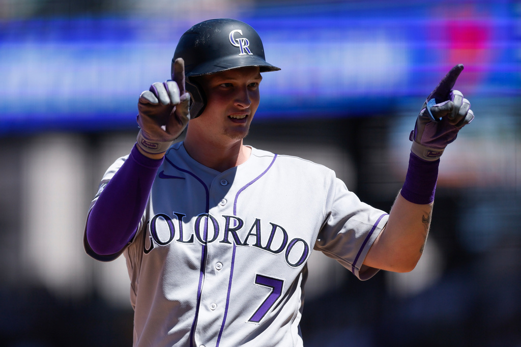 Athletics' TJ Rumfield reacts after hitting an RBI triple during the seventh inning of a baseball game, Sunday, June 14, 2026, in Las Vegas. (AP Photo/Caroline Brehman)