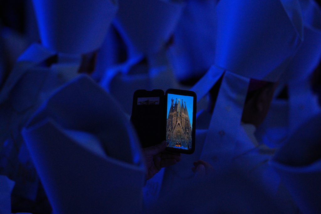 Clergy attend the inauguration of the Tower of Jesus Christ at the Basilica of the Sagrada FamÌlia in Barcelona, Spain, Wednesday, June 10, 2026. CORRECTS FROM PRIESTS TO CLERGY (AP Photo/Emilio Morenatti)