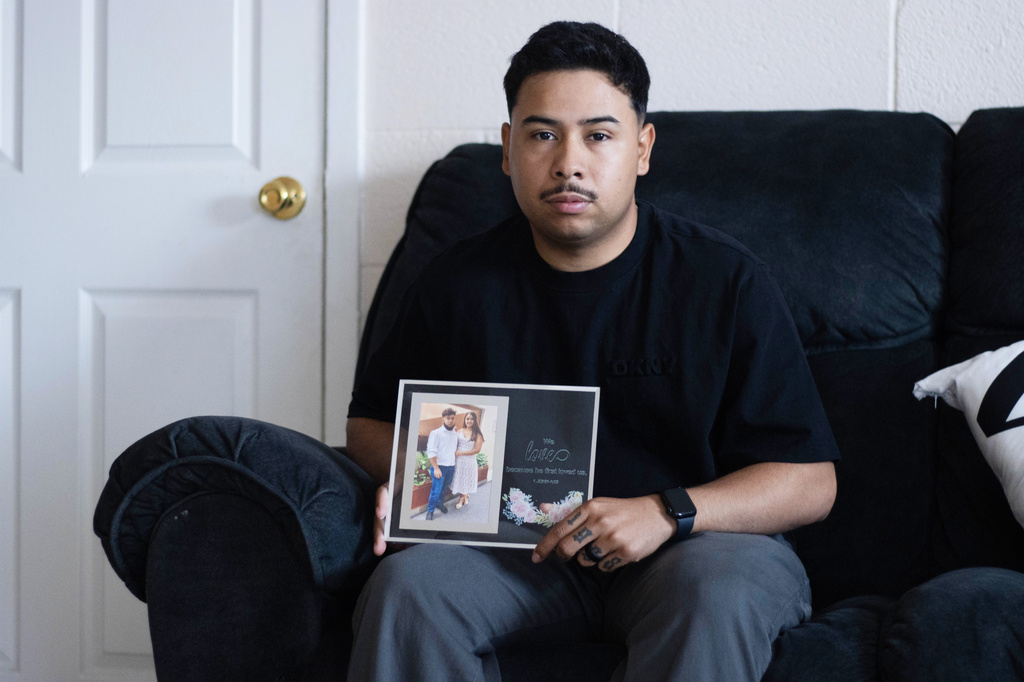 Army Sgt. Hedar Leonel Turcios Juarez, whose wife Cristy has been detained by immigration authorities, poses for a photo at home in El Paso, Texas, July 21, 2026. (AP Photo/Ryan Romero)