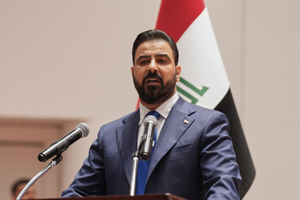 Iraq's Prime Minister-designate Ali al-Zaidi, speaks to Iraqi lawmakers before submitting his government in Baghdad, Iraq, Thursday, May 14, 2026. (Iraqi Presidency Office via AP)