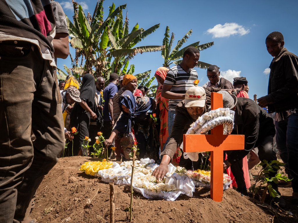 Mourners gather for the funeral of someone who died during post-electoral violence in Arusha, Tanzania, Tuesday, Nov. 4, 2025. (AP Photo)