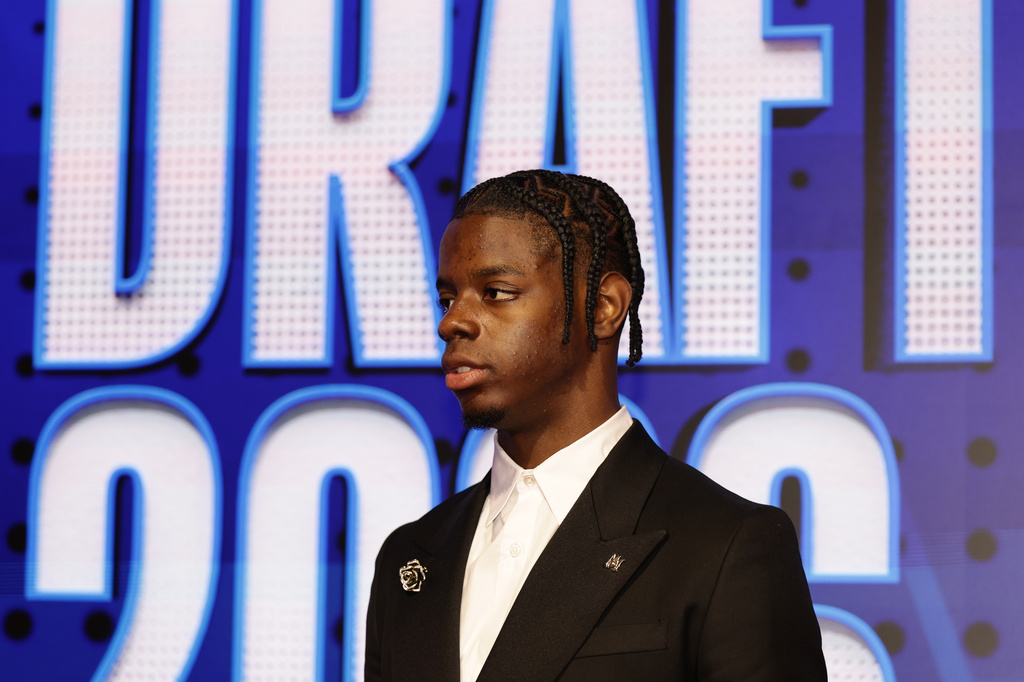 Caleb Wilson arrives for the first round of the NBA basketball draft Tuesday, June 23, 2026, in New York. (AP Photo/Adam Hunger)