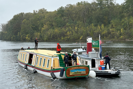 The Seneca Chief travels down the Mohawk River, Oct. 21, 2025, in Glenville, N.Y., commemorating New York Gov. DeWitt Clinton's inaugural 1825 journey along the Erie Canal. (AP Photo/Michael Hill) The Seneca Chief travels down the Mohawk River, Oct. 21, 2025, in Glenville, N.Y., commemorating New York Gov. DeWitt Clinton's inaugural 1825 journey along the Erie Canal. (AP Photo/Michael Hill)