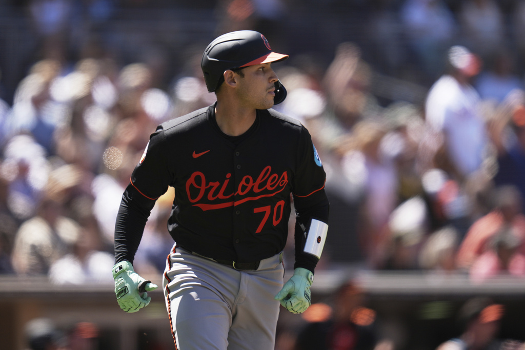Baltimore Orioles' Alex Jackson watches his home run during the third inning of a baseball game against the San Diego Padres Wednesday, Sept. 3, 2025, in San Diego. (AP Photo/Gregory Bull)