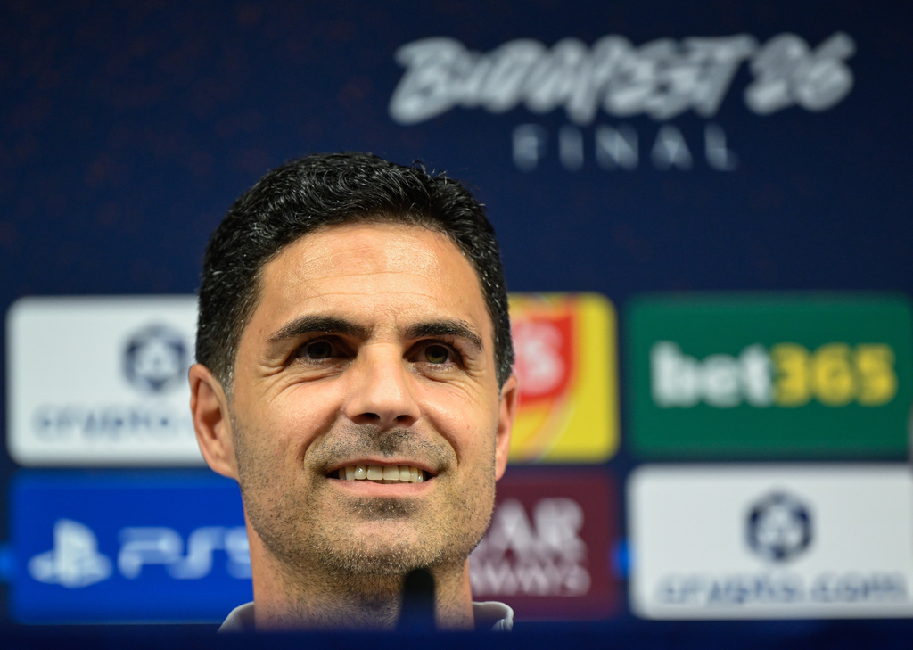 Arsenal's Spanish manager Mikel Arteta meets the media ahead of the Champions League final soccer match between Paris Saint-Germain (PSG) and Arsenal, in Budapest, Friday 29, 2026. (Ina Fassbender, Pool Photo via AP)
