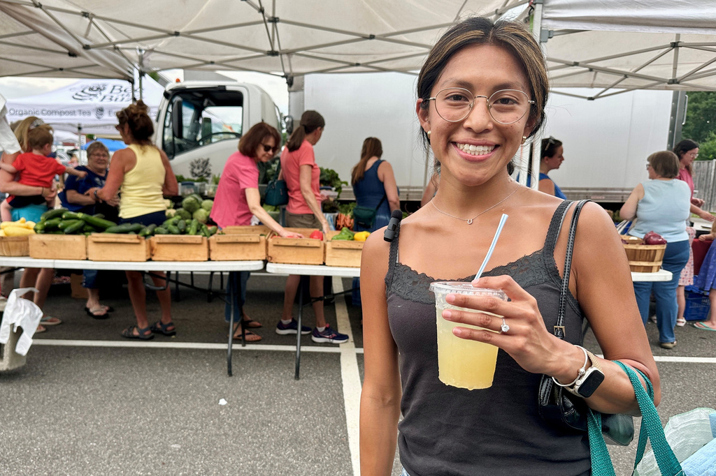 Madeline Capodilupo poses for a photo at a farmers market in Bedford, N.H., Tuesday, June 30, 2026. (AP Photo/Holly Ramer)