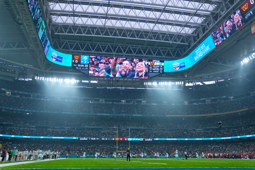 General view of the Santiago Bernabeu Stadium during the first half of an NFL football game between the Washington Commanders and the Miami Dolphins in Madrid, Spain, Sunday, Nov. 16, 2025. (AP Photo/Manu Fernandez)