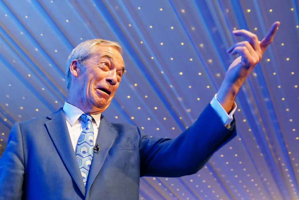 British Reform UK leader Nigel Farage speaks at the Reform UK Scotland manifesto launch and candidate announcement for the upcoming Scottish Parliament elections, at Ingliston Country Club & Hotel in Bishopton, Scotland, Thursday March 19, 2026. (Jane Barlow/PA via AP)