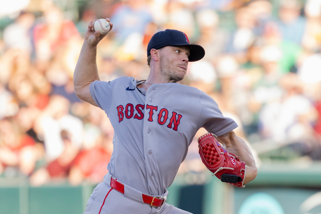Boston Red Sox pitcher Sonny Gray throws to the Athletics during the first inning of a baseball game Thursday, July 30, 2026, in West Sacramento, Calif. (AP Photo/Sara Nevis)