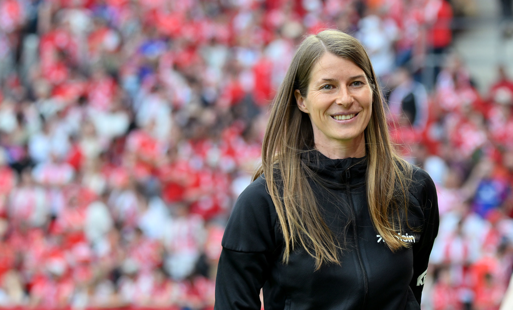 Union Berlin's coach Marie-Louise Eta smiles before the German Bundesliga soccer match between 1. FSV Mainz 05 and 1. FC Union Berlin in Mainz, Germany, Saunday, May 10, 2026. (Torsten Silz/dpa via AP)
