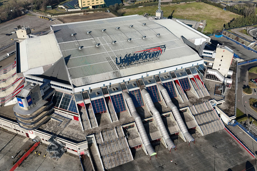 FILE - A view of the Assago Forum which will be the Milano Ice Skating Arena where figure skating and short track speed skating disciplines will take place at the Milan Cortina 2026 Winter Olympics, in Assago, near Milan, Italy, Saturday, Jan. 18, 2025. (AP Photo/Luca Bruno, File) FILE - A view of the Assago Forum which will be the Milano Ice Skating Arena where figure skating and short track speed skating disciplines will take place at the Milan Cortina 2026 Winter Olympics, in Assago, near Milan, Italy, Saturday, Jan. 18, 2025. (AP Photo/Luca Bruno, File)