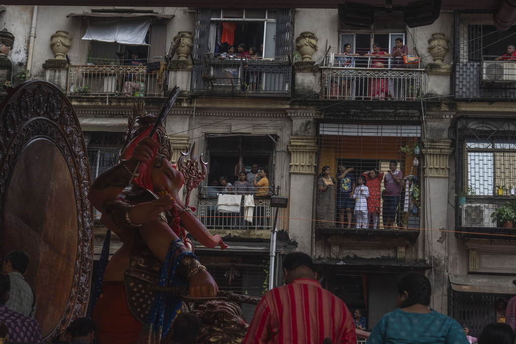 An idol of elephant-headed Hindu god Ganesha is taken for immersion on the final day of the ten-day long Ganesh Chaturthi festival in Mumbai, India, Saturday, Sept. 6, 2025. (AP Photo/Rafiq Maqbool)