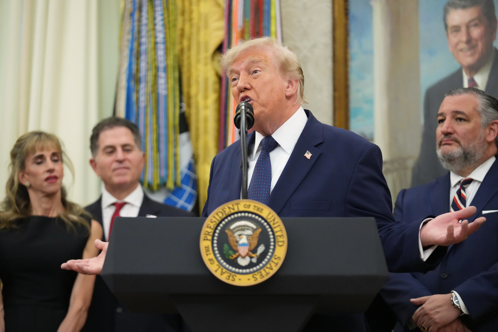President Donald Trump speaks about FIFA after ringing the opening bell for the New York Stock Exchange and the Nasdaq in the Oval Office at the White House, Monday, July 6, 2026, in Washington. (AP Photo/Mark Schiefelbein)