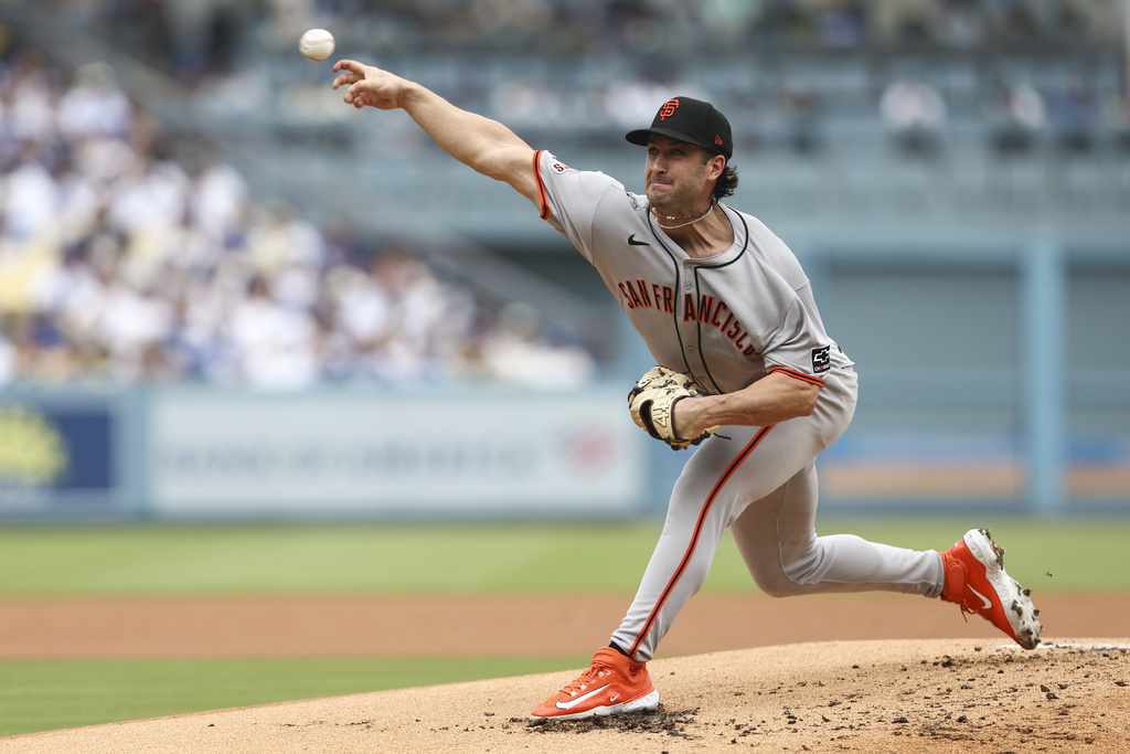San Francisco Giants pitcher Trevor McDonald delivers to a Los Angeles Dodgers batter during the first inning of a baseball game, Sunday, Sept. 21, 2025, in Los Angeles. (AP Photo/Jessie Alcheh)