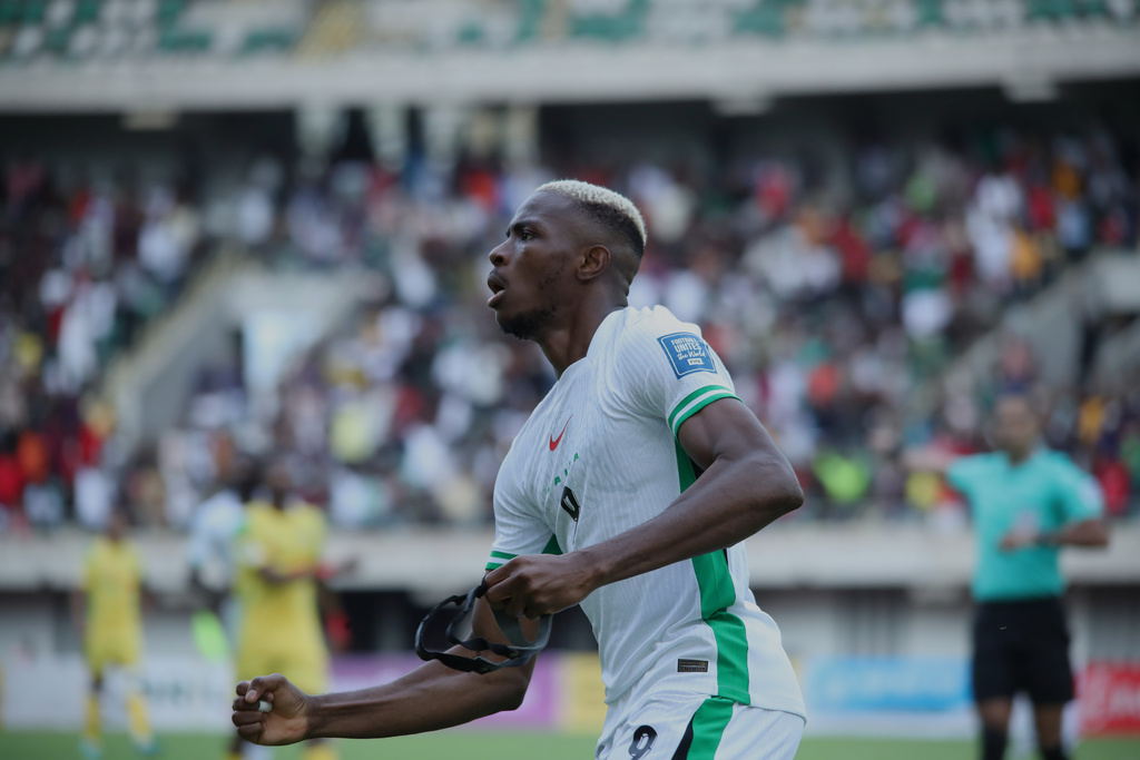 Nigeria's Victor Osimhen, celebrates after scoring his side's second goal during a World Cup Group C qualifying soccer match between Nigeria and Benin in Uyo, Nigeria, Tuesday, Oct. 14, 2025. (AP Photo/Justina Aniefiok)