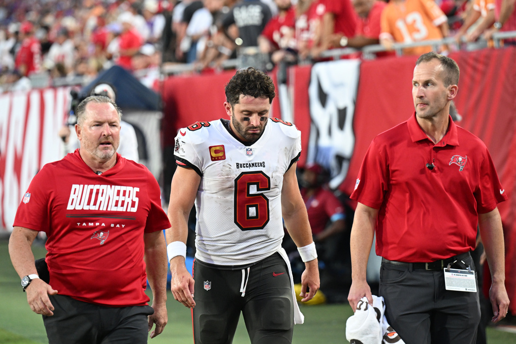 Tampa Bay Buccaneers quarterback Baker Mayfield (6) leaves the field during the second half of an NFL football game against the Minnesota Vikings in Tampa, Fla., Sunday, Sept. 27, 2026. (AP Photo/Jason Behnken)