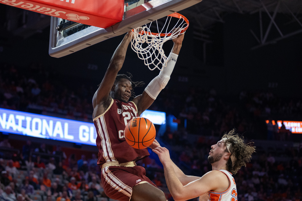 Boston College forward Jayden Hastings (22) dunks against the Clemson during the first half of an NCAA college basketball game Tuesday, Jan. 13, 2026, in Clemson, S.C. (AP Photo/Scott Kinser)