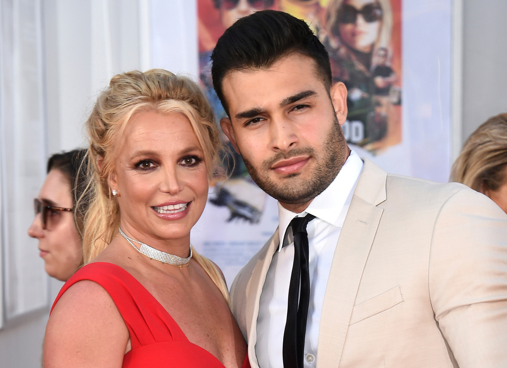 FILE - Britney Spears and Sam Asghari appear at the Los Angeles premiere of "Once Upon a Time in Hollywood," on July 22, 2019. (Photo by Jordan Strauss/Invision/AP, File)