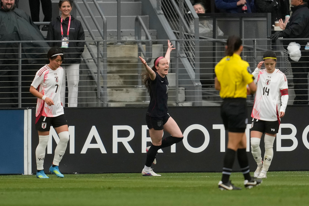 The United States' Rose Lavelle, middle, celebrates after scoring against Japan during the first half of an international friendly soccer match Saturday, April 11, 2026, in San Jose, Calif. (AP Photo/Jeff Chiu)