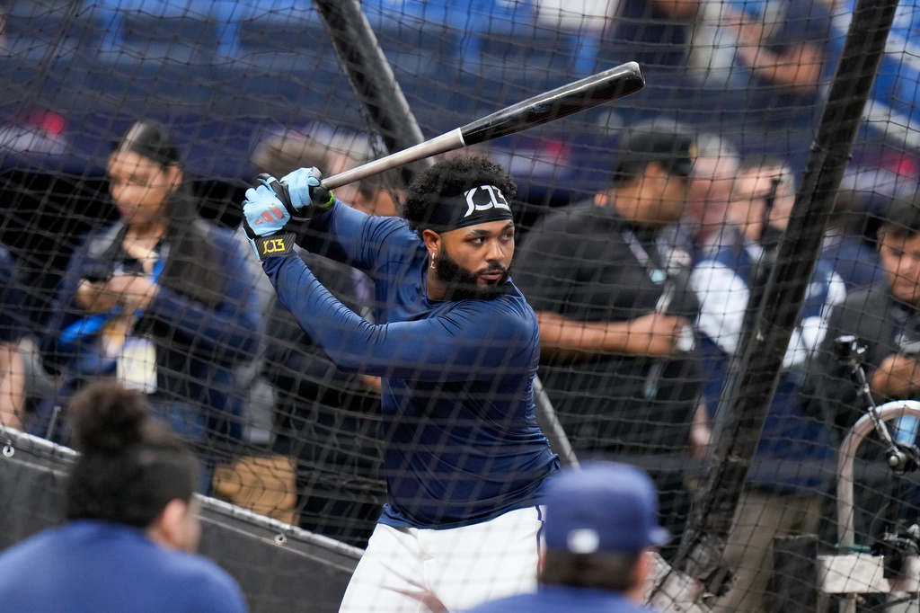 Tampa Bay Rays third baseman Junior Caminero takes batting practice prior to Game 4 of baseball's World Series, Tuesday, Oct. 27, 2026, in St. Petersburg, Fla., between the Milwaukee Brewers and the Tampa Bay Rays. (AP Photo/Chris O'Meara)