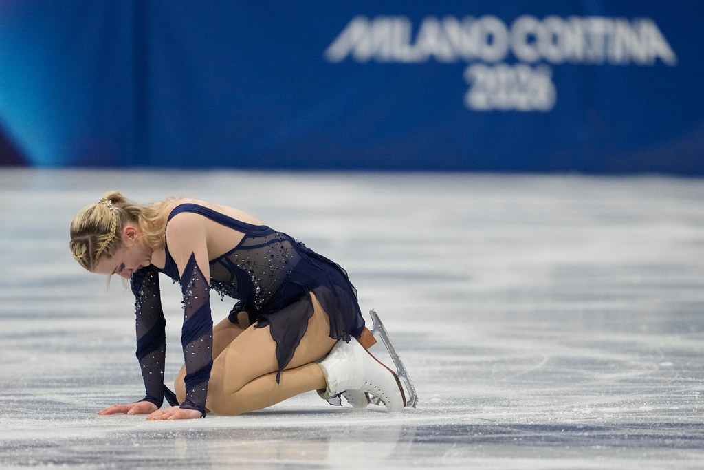 Amber Glenn of the United States competes during the figure skating women's team event at the 2026 Winter Olympics, in Milan, Italy, Sunday, Feb. 8, 2026. (AP Photo/Ashley Landis)