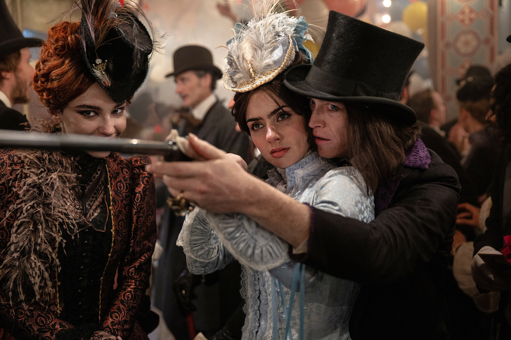 This image released by Vertical Entertainment shows Matilda De Angelis, from left, Zoë Bleu, and Caleb Landry Jones in a scene from "Dracula." (Vertical Entertainment via AP)