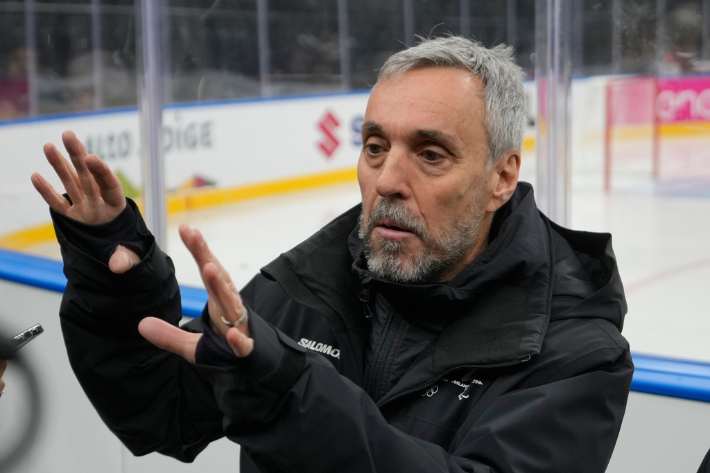 Andrea Varnier, CEO Fondazione Milano Cortina 2026 talks to reporters at the Santa Giulia Ice Hockey Arena, in Milan, where Ice Hockey discipline of the Milan Cortina 2026 Winter Olympics will take place, in Milan, Italy, Sunday, Jan. 11, 2026. (AP Photo/Luca Bruno)