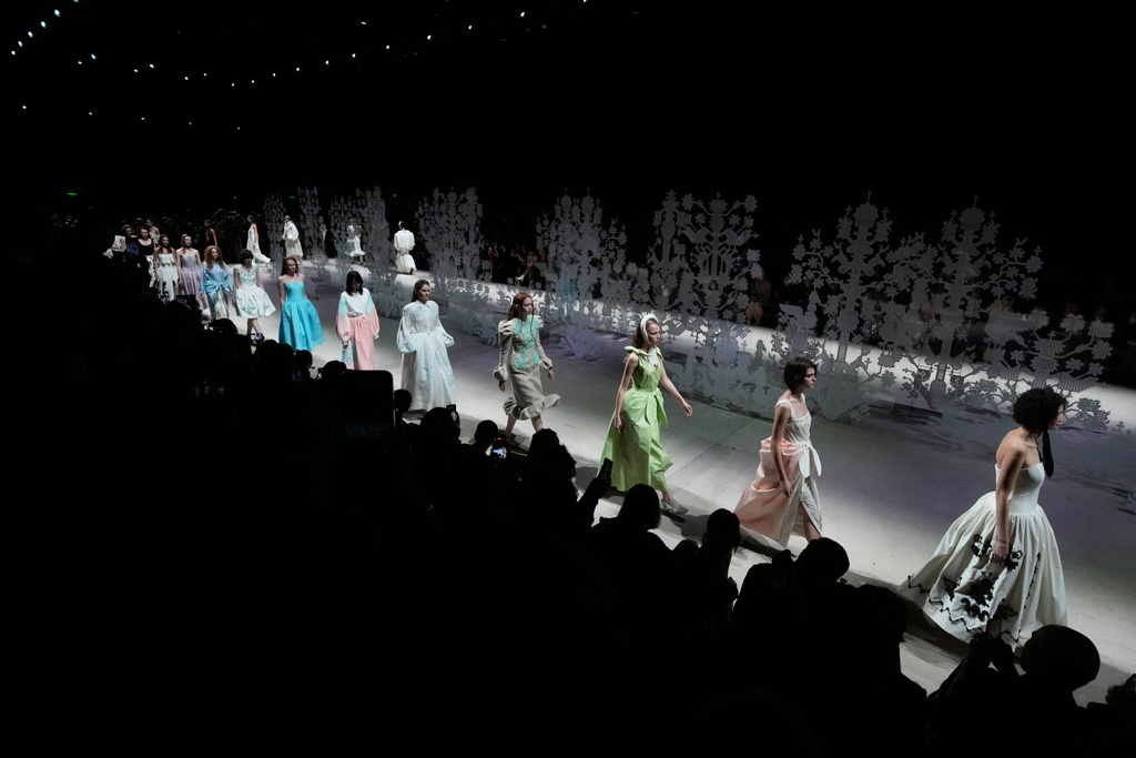 Models wear creations by Russian designer Alena Akhmadullina on a runway at the Moscow Fashion Week in Moscow, Saturday, March 14, 2026. (AP Photo/Pavel Bednyakov)