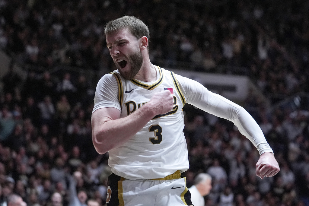 Purdue guard Braden Smith (3) celebrates after being fouled by Iowa during the second half of an NCAA college basketball game in West Lafayette, Ind., Wednesday, Jan. 14, 2026. (AP Photo/Michael Conroy)