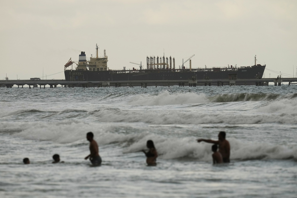 Evana, an oil tanker, is docked at El Palito port in Puerto Cabello, Venezuela, Sunday, Dec. 21, 2025. (AP Photo/Matias Delacroix)